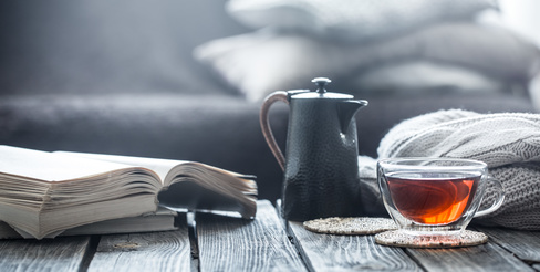 still life book and a cup of tea in the living room